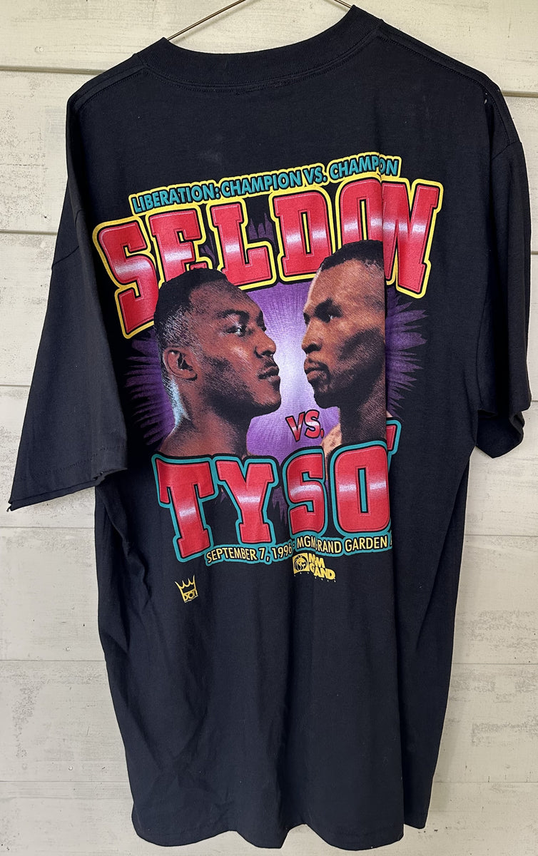 TYSON, MIKE-BRUCE SELDON SOUVENIR T SHIRT (1996) – JO Sports Inc. TYSON, MIKE-BRUCE SELDON SOUVENIR T SHIRT (1996) – JO Sports Inc.