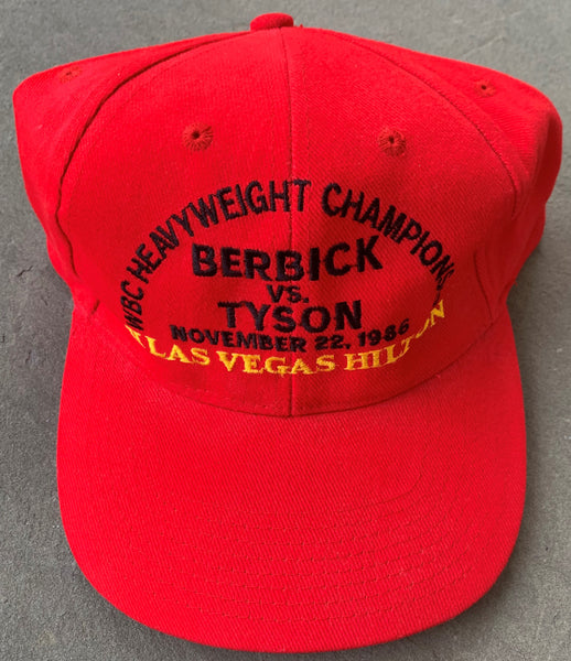 TYSON, MIKE-TREVOR BERBICK ORIGINAL SOUVENIR HAT (1986)