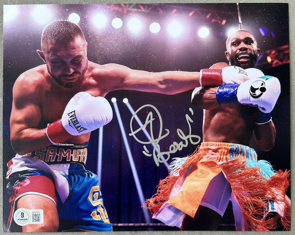 ENNIS, JARON "BOOTS" SIGNED ACTION PHOTO (BECKETT)