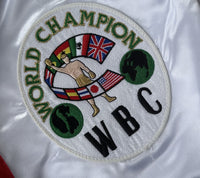 FOREMAN, GEORGE SIGNED BOXING TRUNKS (PSA/DNA)