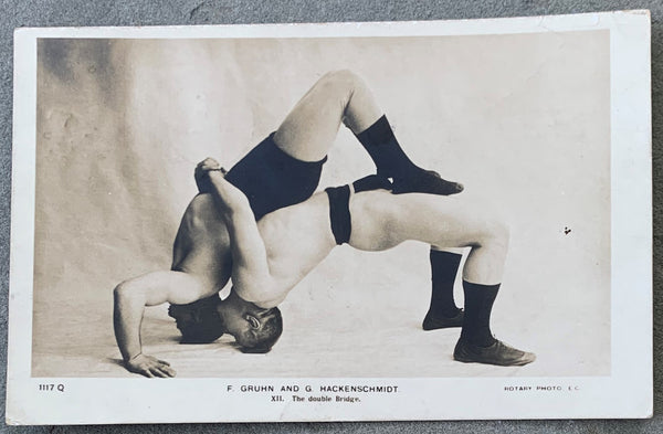 HACKENSCHMIDT, GEORGE & FERDINAND GRUHN REAL PHOTO POSTCARD (1904)