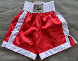 HOLMES, LARRY & KEN NORTON SIGNED BOXING TRUNKS