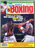 HOLMES, LARRY & MICHAEL SPINKS SIGNED WORLD BOXING MAGAZINE (1986-JSA)