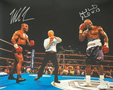TYSON, MIKE & EVANDER HOLYFIELD SIGNED LARGE FORMAT EAR BITE PHOTO (JSA & BECKETT)
