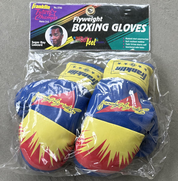 LEONARD, SUGAR RAY ENDORSED CHILD'S BOXING GLOVES (IN ORIGINAL PACKAGING)