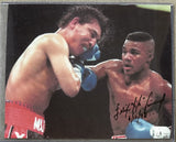 TRINIDAD, FELIX "TITO" SIGNED ACTION PHOTO (PSA/DNA)
