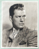 TUNNEY, GENE VINTAGE SIGNED STUDIO PHOTO (JSA)