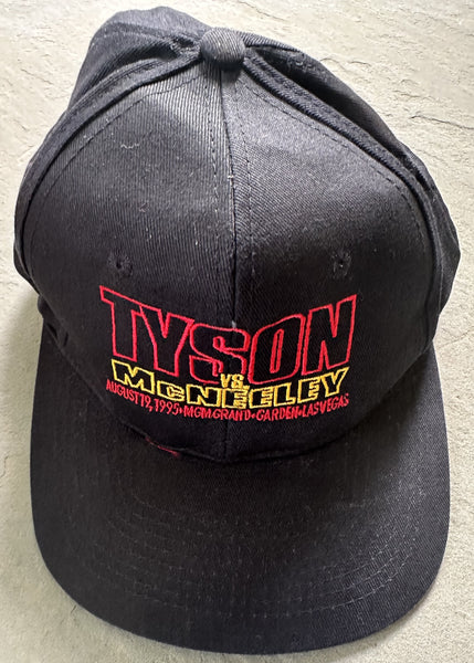 TYSON, MIKE-PETER MCNEELEY SOUVENIR HAT (1995-NEVER WORN)