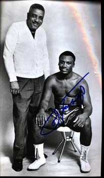 FRAZIER, JOE SIGNED PHOTO (POSING WITH YANK DURHAM)