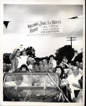 LAMOTTA, JAKE HOMECOMING WIRE PHOTO (1949-AFTER CERDAN FIGHT)