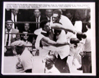 CLAY, CASSIUS-SONNY LISTON I LARGE FORMAT WIRE PHOTO (1964)