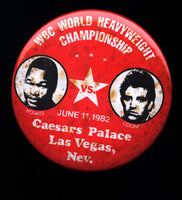 HOLMES, LARRY-GERRY COONEY SOUVENIR PIN (1982)