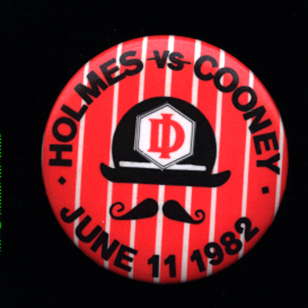 HOLMES, LARRY-GERRY COONEY VINTAGE PIN (1982)