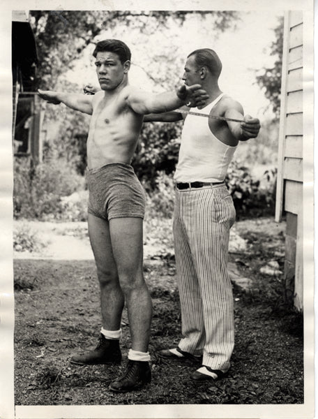 SHARKEY, JACK TRAINING WIRE PHOTO (1929-LOUGHRAN FIGHT)