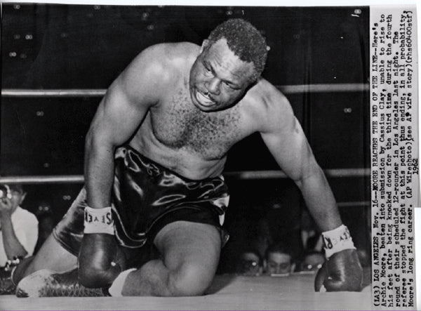 CLAY, CASSIUS-ARCHIE MOORE WIRE PHOTO (1962-END OF FIGHT)