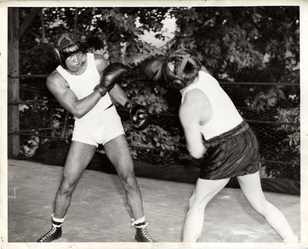 LOUIS, JOE TRAINING WIRE PHOTO