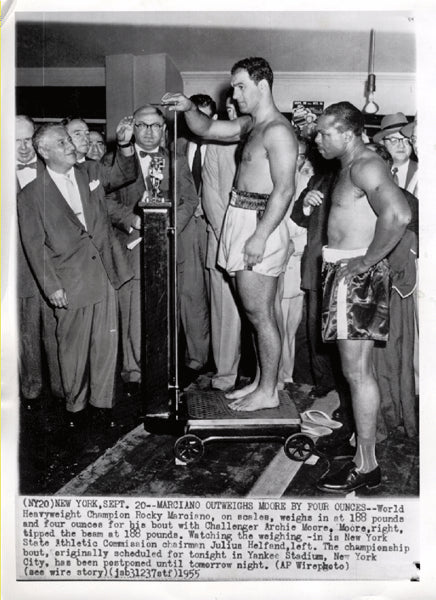 MARCIANO, ROCKY-ARCHIE MOORE WIRE PHOTO (1955-WEIGH IN)