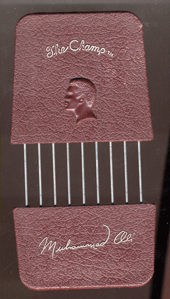 ALI, MUHAMMAD VINTAGE ENDORSED HAIR PICK (IN CASE)