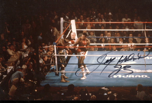 HOLMES, LARRY SIGNED ACTION PHOTO