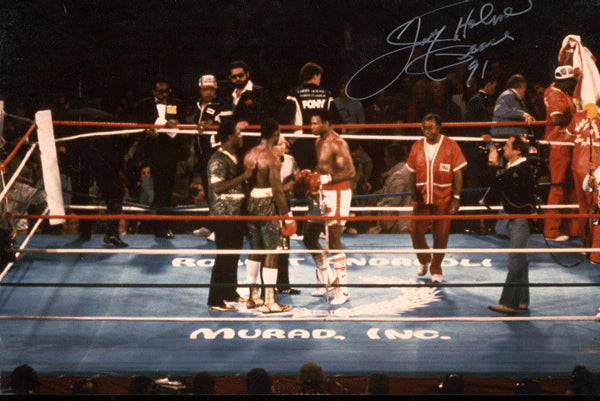 HOLMES, LARRY SIGNED ACTION PHOTO