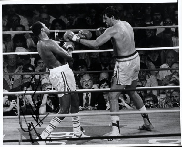 HOLMES, LARRY-GERRY COONEY SIGNED PHOTO (SIGNED BY HOLMES)