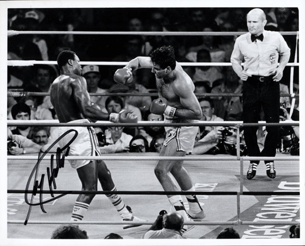 HOLMES, LARRY-GERRY COONEY SIGNED PHOTO (SIGNED BY HOLMES)