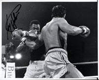 HOLMES, LARRY-GERRY COONEY SIGNED PHOTO (SIGNED BY HOLMES)