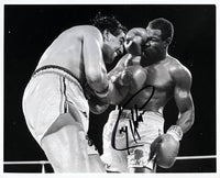 HOLMES, LARRY-GERRY COONEY SIGNED PHOTO (SIGNED BY HOLMES)