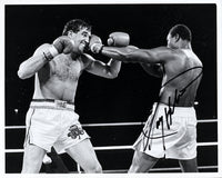 HOLMES, LARRY-GERRY COONEY SIGNED PHOTO (SIGNED BY HOLMES)