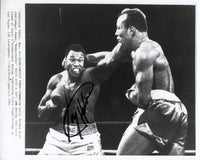 HOLMES, LARRY-BONECRUSHER SMITH SIGNED WIRE PHOTO (SIGNED BY HOLMES)