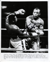 HOLMES, LARRY-BONECRUSHER SMITH SIGNED WIRE PHOTO (SIGNED BY HOLMES)