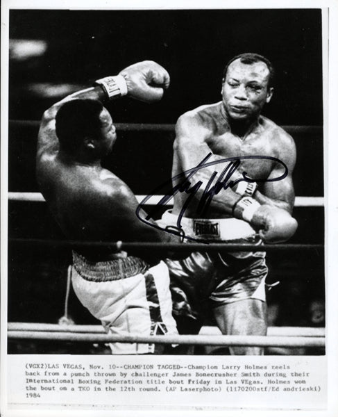 HOLMES, LARRY-BONECRUSHER SMITH SIGNED WIRE PHOTO (SIGNED BY HOLMES)