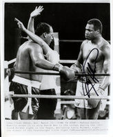 HOLMES, LARRY SIGNED WIRE PHOTO