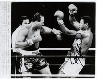 HOLMES, LARRY SIGNED WIRE PHOTO