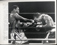 HOLMES, LARRY SIGNED WIRE PHOTO