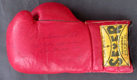 ALI, MUHAMMAD SIGNED TRAINING WORN GLOVE (1974-FOREMAN FIGHT)