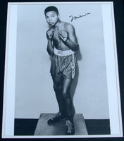 ALI, MUHAMMAD SIGNED PHOTOGRAPH (LARGE FORMAT-15 YEARS OLD)