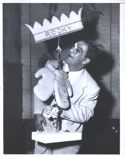 MARCIANO, ROCKY ORIGINAL WIRE PHOTO (1952-CELEBRATING WALCOTT VICTORY)
