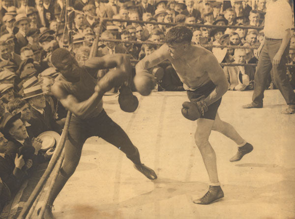 DEMPSEY, JACK TRANING CAMP WIRE PHOTO (SPARRING-EARLY 1920'S)