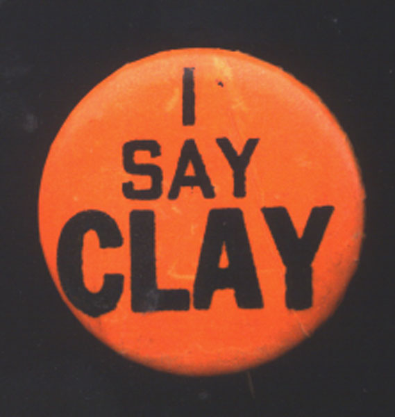 CLAY, CASSIUS SOUVENIR PIN "I SAY CLAY"