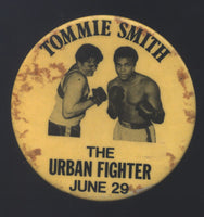 ALI, MUHAMMAD-TOMMIE SMITH URBAN FIGHTER SOUVENIR PIN (1979)