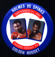 HOLMES, LARRY-MICHAEL SPINKS I SOUVENIR PIN (1985)