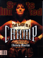 MARTIN, CHRISTY SIGNED MAGAZINE (SPORTS ILLUSTRATED APRIL 15, 1996)