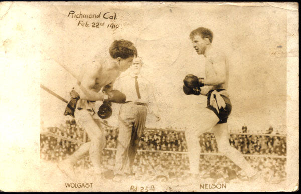 WOLGAST, AD-BATTLING NELSON REAL PHOTO POSTCARD (1910-25TH ROUND)