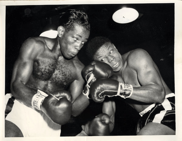 LOGART, ISSAC-VIRGIL AKINS WIRE PHOTO (1955)