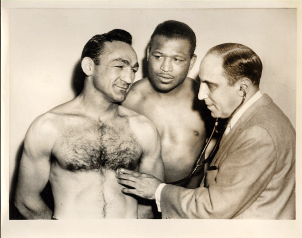 ROBINSON, SUGAR RAY-CARMEN BASILIO II WIRE PHOTO (1958-MEDICAL EXAM)