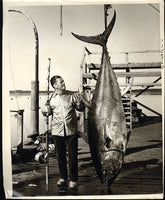 TUNNEY, GENE WIRE PHOTO (FISHING IN NOVA SCOTIA)