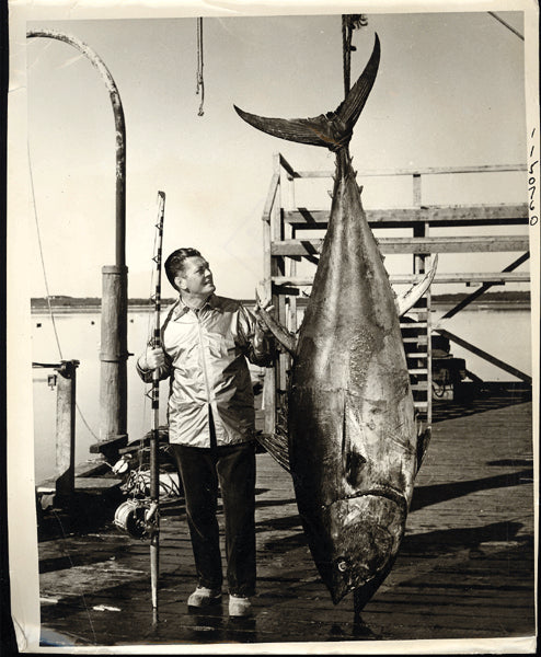 TUNNEY, GENE WIRE PHOTO (FISHING IN NOVA SCOTIA)