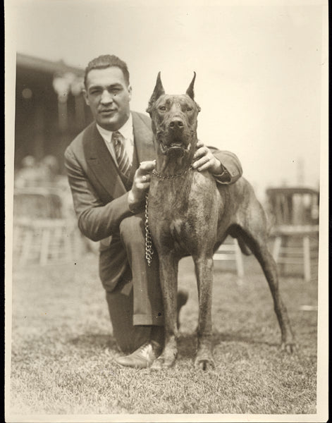 BERLENBACH, PAUL WIRE PHOTO (WITH HIS DOG SHORTY)