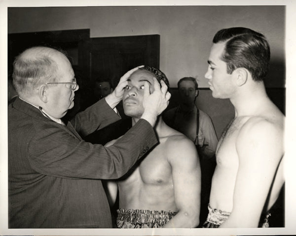 ARMSTRONG, HENRY-BARNEY ROSS WIRE PHOTO (1938-MEDICAL EXAM)